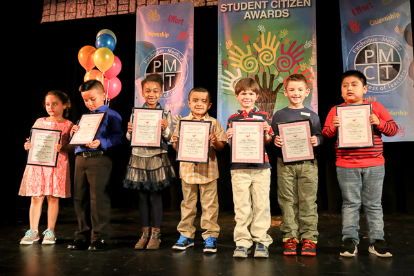 A Group of Children Holding Awards in Hands Copy