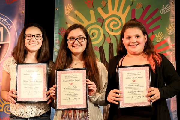 A Group of Three Girls Holding Awards