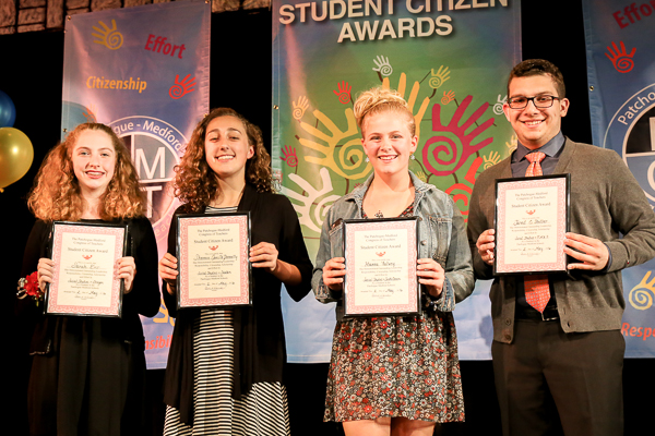 A Group of Students Displaying Awards Three