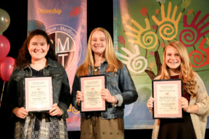 A Group of Students Displaying Awards Nine